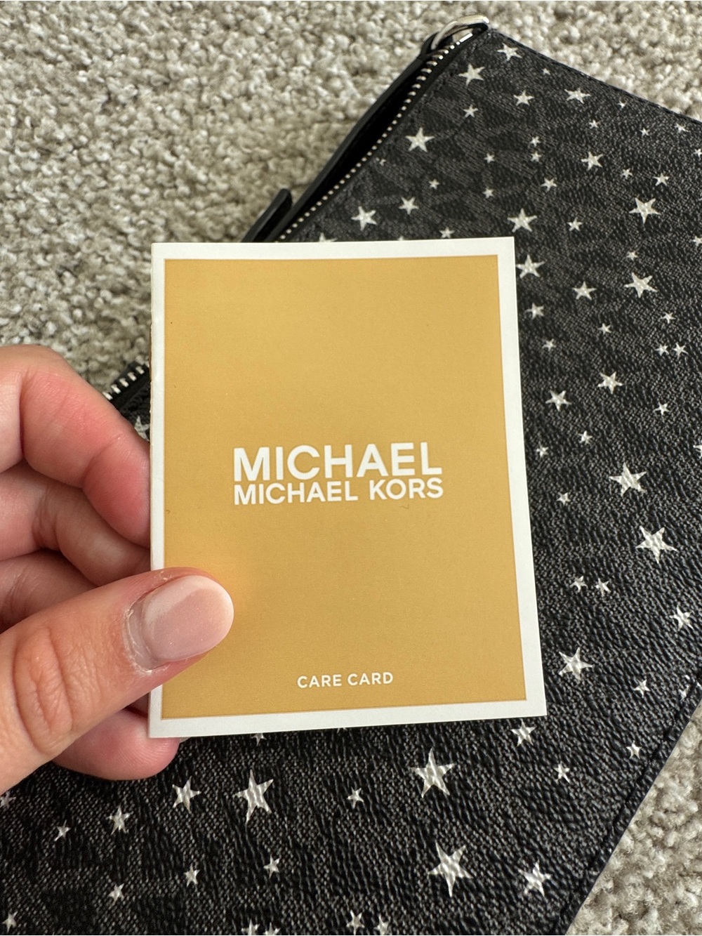 Michael Kors Black Star Print Crossbody Pouch - Picture 6 of 6